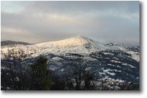 Foto Busalla&Ronco Scrivia - Panorami - Luce del tramonto con neve sul Monte Alpe