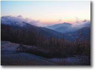 Foto Savignone - Panorami - Tramonto con nevischio e nebbie da Montemaggio