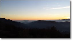 Foto Savignone - Panorami - Tramonto da Montemaggio: i forti e il mare