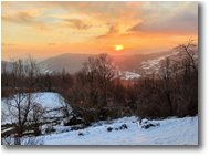 Fotografie Savignone - Panorami - Tramonto impressionista con neve