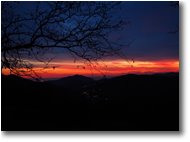 Foto Savignone - Panorami - Tramonto invernale verso i forti di Genova e il mare