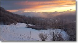 Foto Savignone - Panorami - Tramonto sulla neve, da Montemaggio verso i forti di Genova