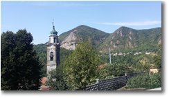 Foto ValBrevenna - Paesi - Campanile di Nenno e Monte Maggio