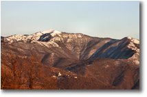 Foto ValBrevenna - Panorami - Tramonto invernale con neve sul Monte Antola 